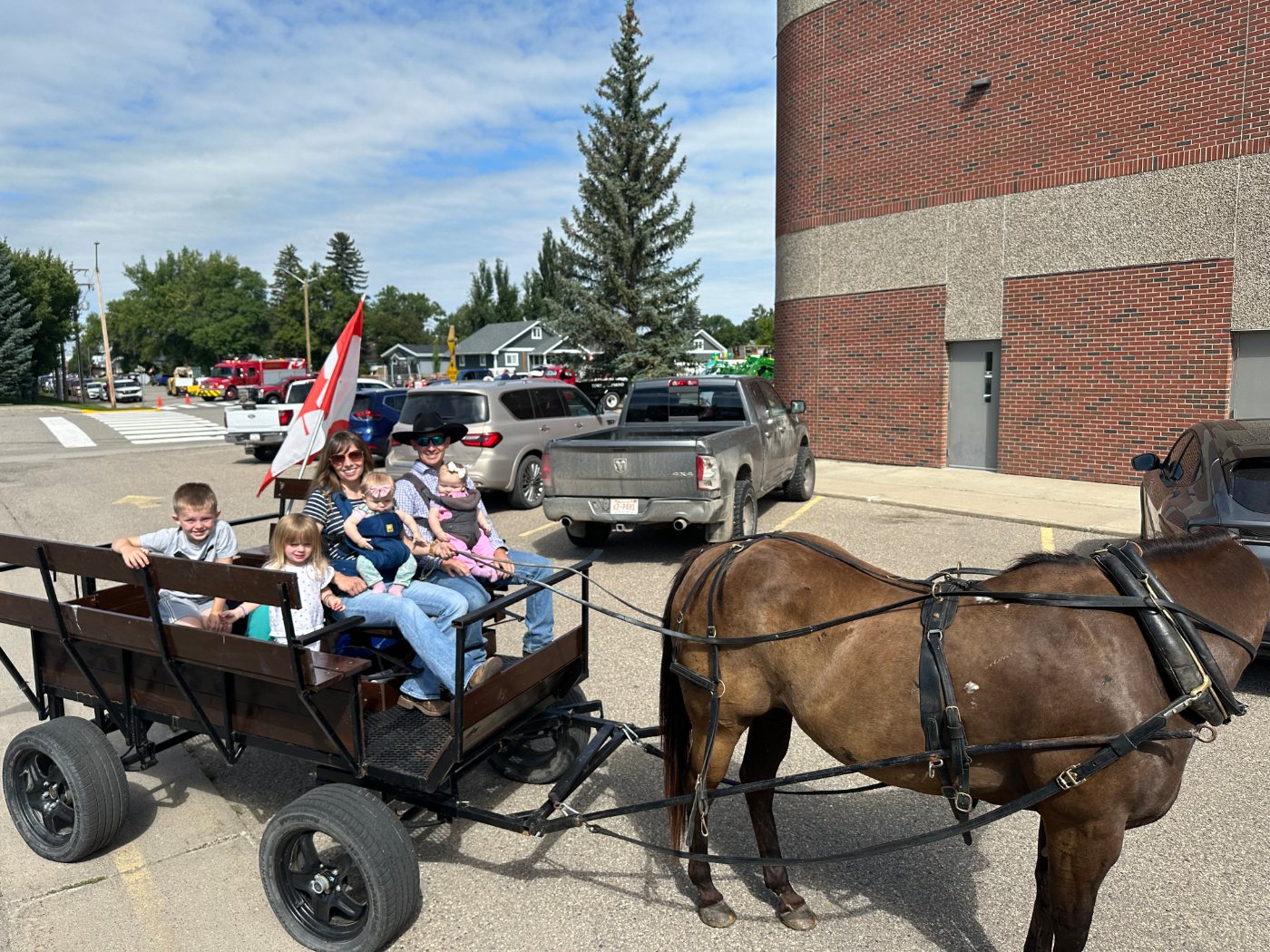 Dr. Holladay and his family in their horse-drawn wagon